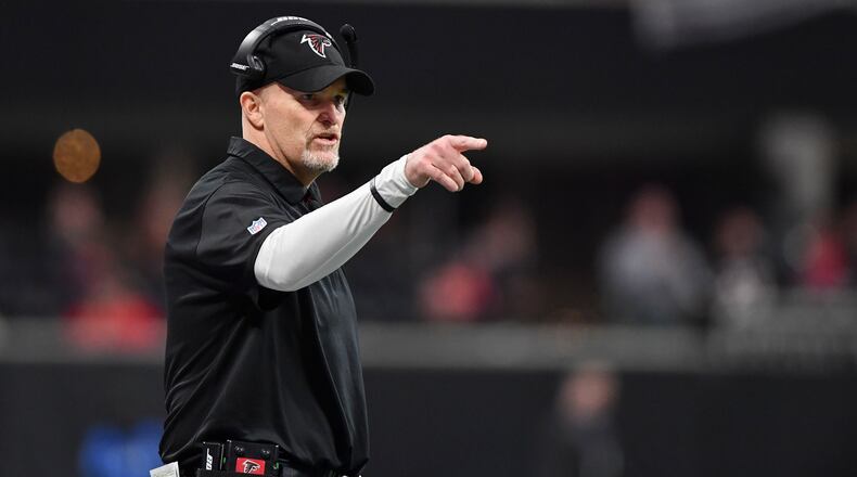 Atlanta Falcons head coach Dan Quinn during the first half against the Carolina Panthers. Sunday December 31, 2017. Photo by Brant Sanderlin/AJC