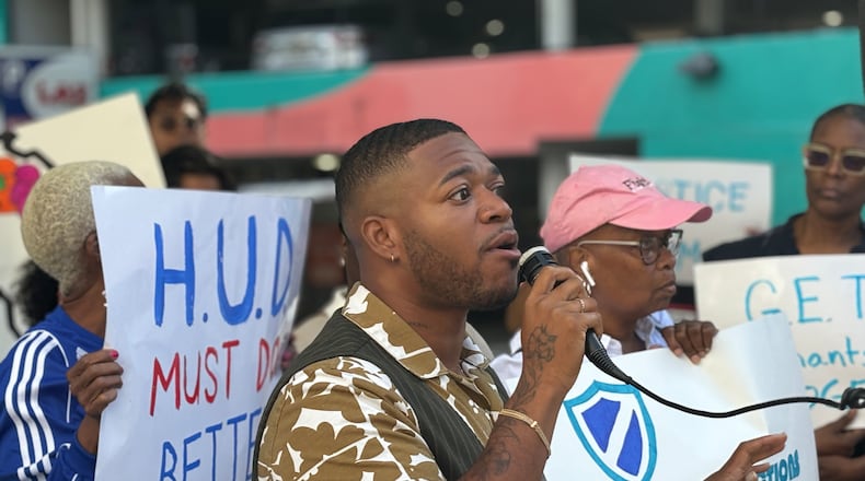 Community organizer Devin Barrington-Ward speaks at a demonstration urging U.S. Department of Housing and Urban Development oversight of apartment complexes on Wednesday, Sept. 4. 2024 (Matt Reynolds/AJC)