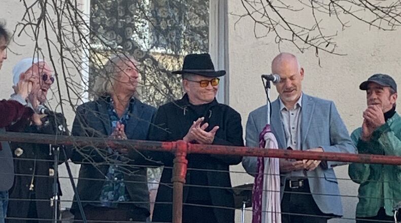 On Nov. 3, 2023, Monkees star Mickey Dolenz gets the key from Athens mayor Kelly Darryl Girtz while three members of R.E.M. join him: Michael Stipe, Peter Buck and Bill Berry. CONTRIBUTED/DIXIE TAYLOR