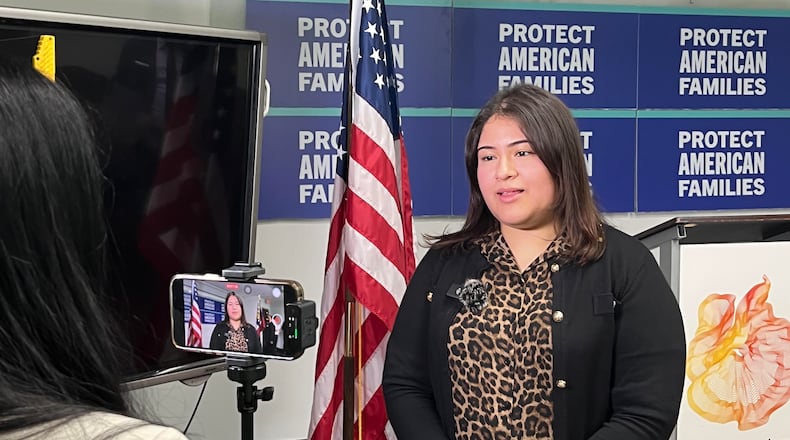 Briseyda Neri speaks to reporters at the Latin American Association in Atlanta on Wednesday, May 15. (Lautaro Grinspan)