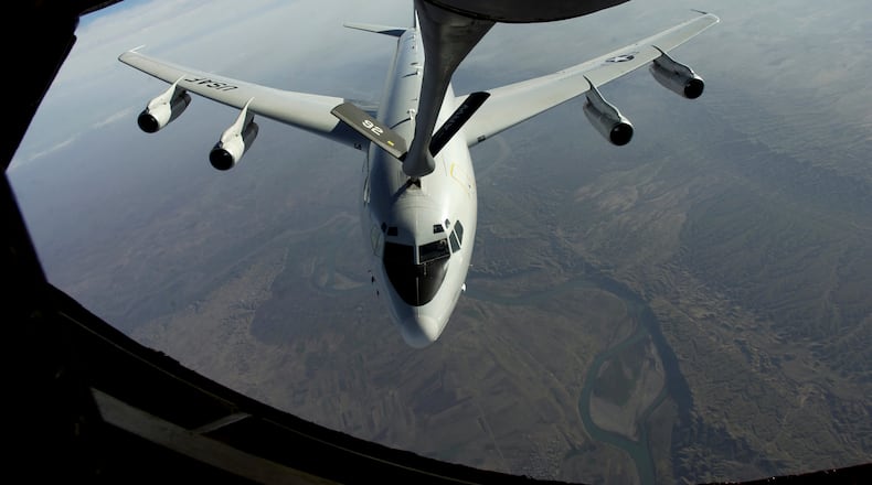 A U.S. Air Force photo of an E-8C Joint Surveillance Target Attack Radar System (JSTARS) receiving fuel from a KC-135 tanker plane in 2004. (U.S. Air Force via The New York Times)