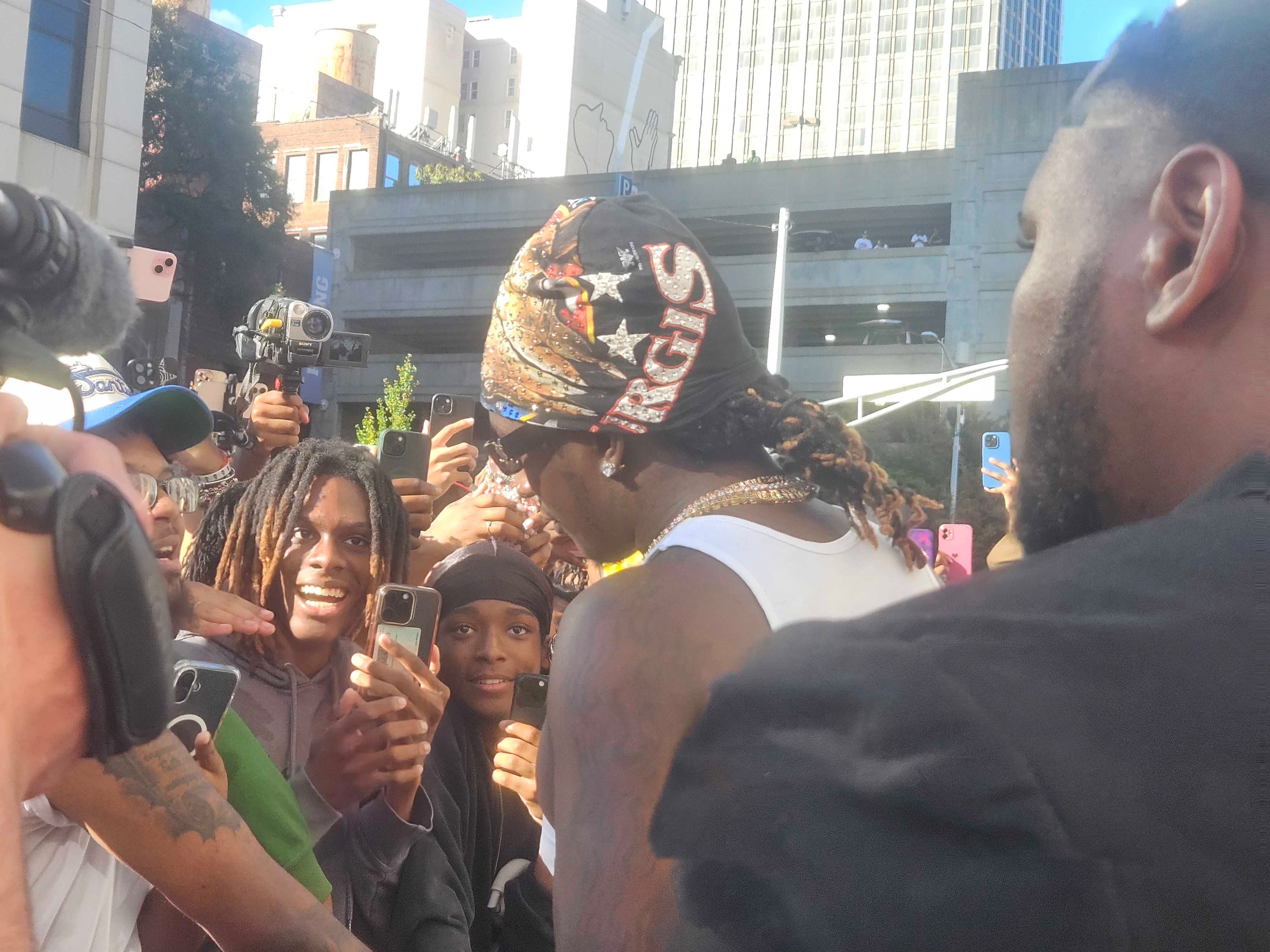 Young Thug interacted with fans and signed autographs during his free concert at Fulton County Courthouse on Sept. 28, 2025. Photo credit: DeAsia Paige