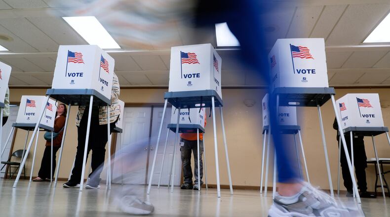 FILE - People vote in Oak Creek, Wis., on Nov. 5, 2024. (AP Photo/Morry Gash, File)