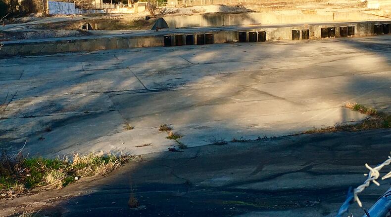 Remains of the old Fenner Dunlop/Georgia Duck and Cordage mills that date to the early 20th century, looking east towards Laredo Drive in Avondale Estates. Avila Real estate is proposing a mixed use project for the site, with early plans calling for 300 to 400 apartments. Bill Banks for the AJC.