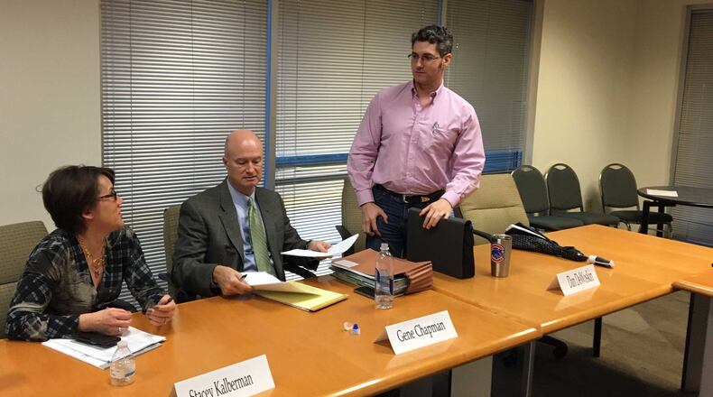 DeKalb Ethics Officer Stacey Kalberman, board attorney Gene Chapman and board member Daniel DeWoskin talk after Thursday’s DeKalb Board of Ethics meeting. The board voted to pursue legislation that would allow it to continue overseeing ethics cases even if it loses a lawsuit over its authority. MARK NIESSE / MARK.NIESSE@AJC.COM