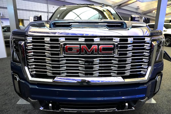 FILE - This is the grill on a GMC Sierra Heavy Duty Denali HD 2500 truck on display at the Pittsburgh International Auto Show in Pittsburgh, Feb. 15, 2024. (AP Photo/Gene J. Puskar, File)