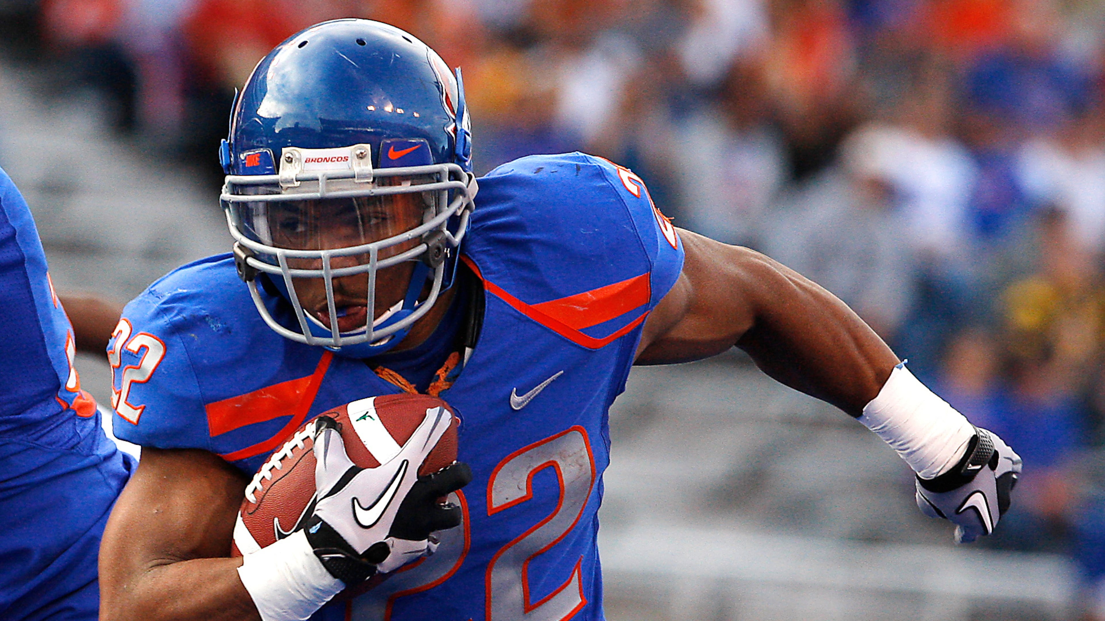 FILE - Boise State's doug Martin runs for a first down during the first half of the NCAA college football game against Toledo, Saturday, Oct. 9, 2010 in Boise, Idaho. (AP Photo/Matt Cilley, File)