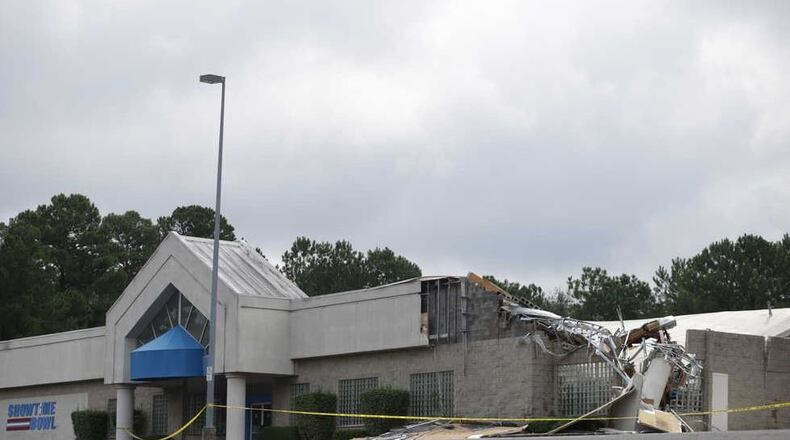 The Showtime Bowling Center’s roof caved around 10 p.m. Thursday due to heavy rain. (Credit: Athens Banner-Herald)