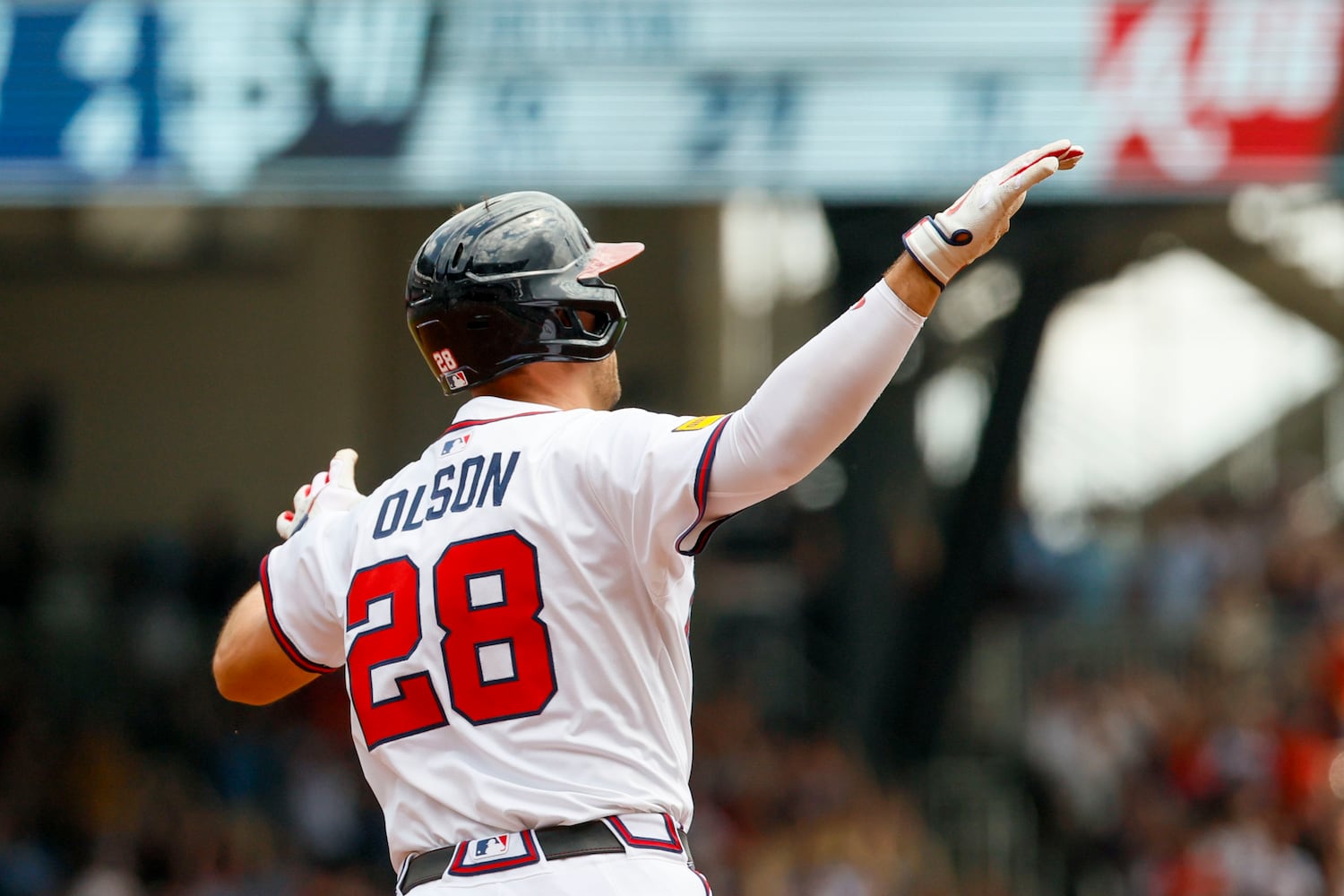 Atlanta Braves first base Matt Olson (28) reacts as he rounds the bases after hitting a two-RBI home run during the first inning against the Minnesota Twins at Truist Park on Sunday, April 20, 2025, in Atlanta. 
(Miguel Martinez/ AJC)