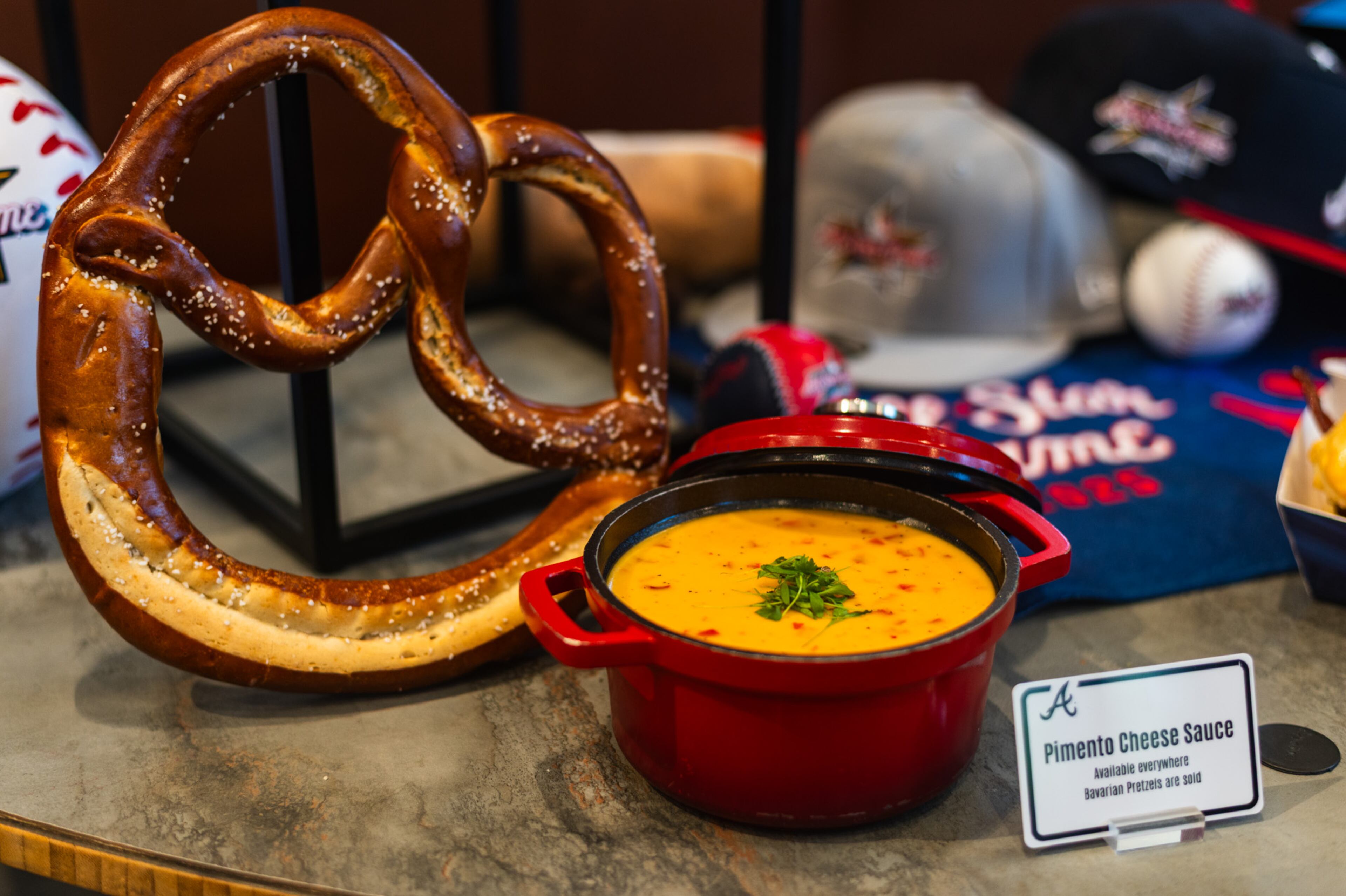 Pimento cheese mornay sauce will be available wherever Bavarian pretzels are sold at Truist Park during MLB All-Star weekend. (Henri Hollis / henri.hollis@ajc.com)
