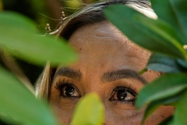 Maria, who requested to use only her first name out of fear of deportation, is photographed Thursday, June 26, 2025, in Sacramento. (AP Photo/Godofredo A. Vásquez)
