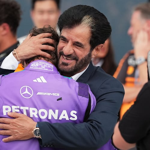 Mohammed Ben Sulayem President of the Federation Internationale de l'Automobile (FIA) hugs Mercedes driver Kimi Antonelli of Italy after Antonelli won the Miami Formula One Grand Prix auto race, Sunday, May 3, 2026, in Miami Gardens, Fla. (AP Photo/Rebecca Blackwell)