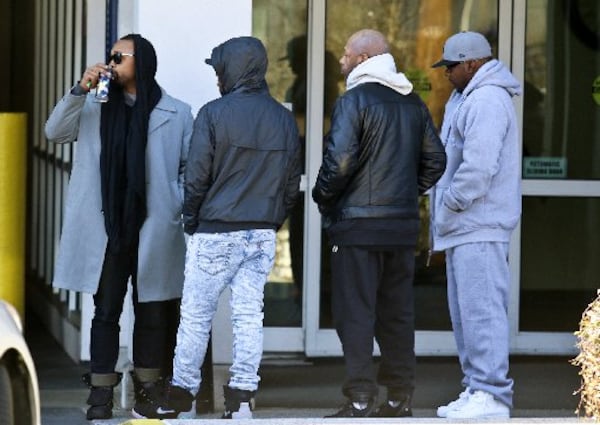 Bobby Brown, right, at Emory Hospital in Atlanta where his daughter Bobbi Kristina Brown is being treated AP Photo/Ron Harris