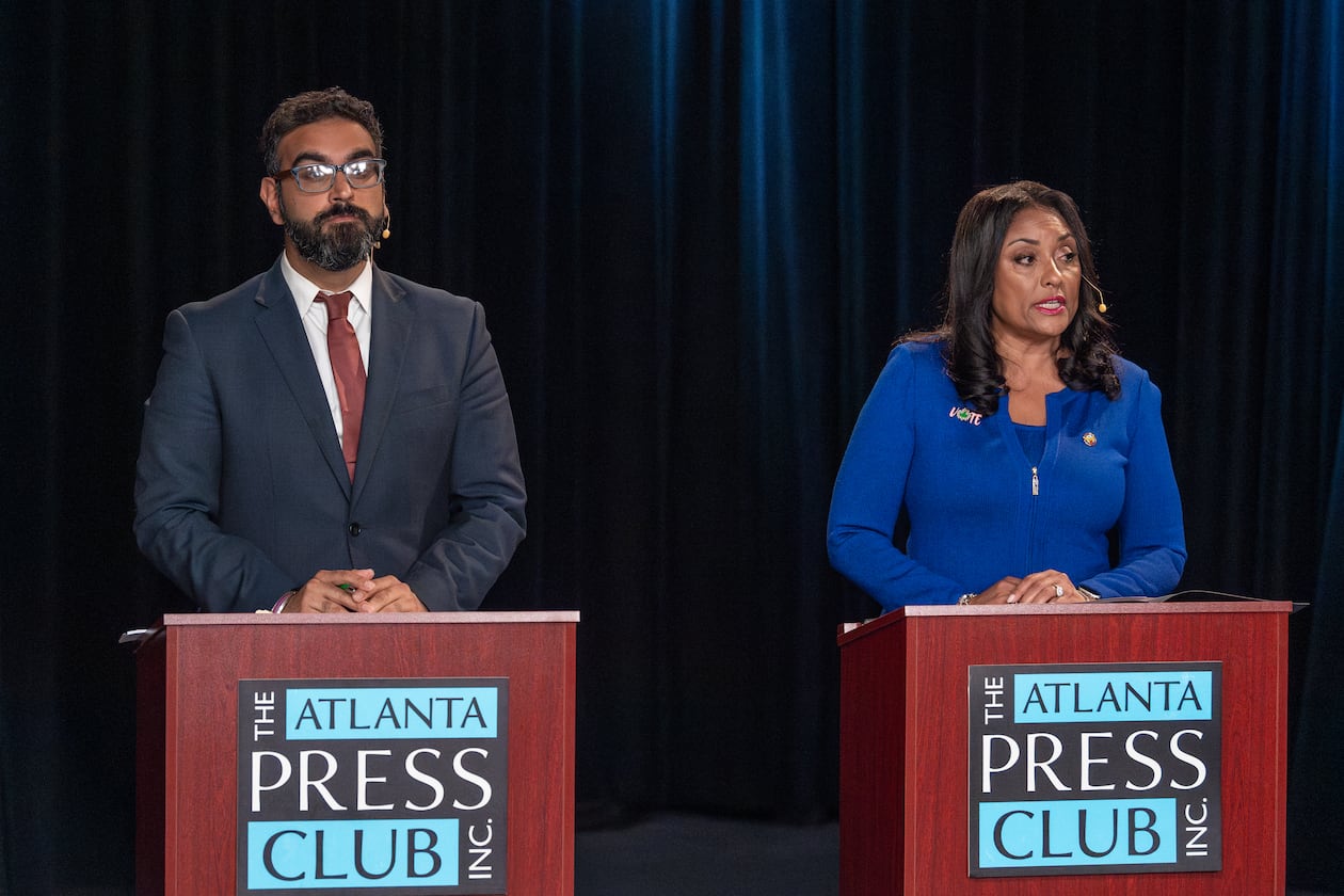 Rohit Malhotra (left) and Council member Marci Collier Overstreet, candidates for Atlanta City Council president, face off during the Atlanta Press Club debate Oct. 10, 2025. (Courtesy of John Glenn)