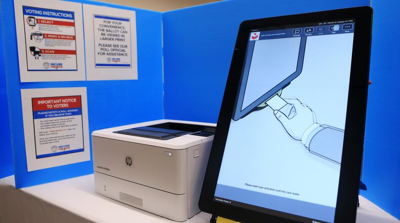 The new voting stations used during the mock election for Fulton County on Tuesday, February 18, 2020, at the Roswell Library in Roswell, Georgia.  Fulton County held a mock election to test out its new voting machines and system. (Christina Matacotta for the Atlanta Journal-Constitution)