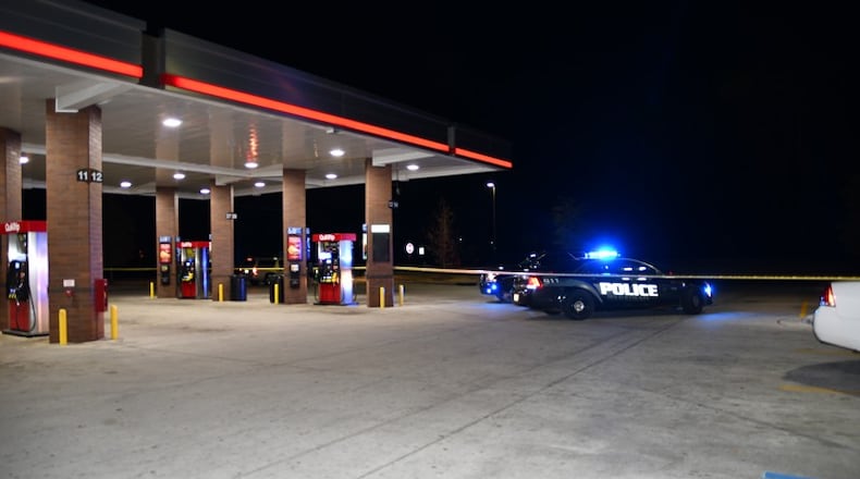 A man died in a shootout Saturday night outside a QuikTrip at the corner of Flat Shoals Parkway and Clifton Springs Road.