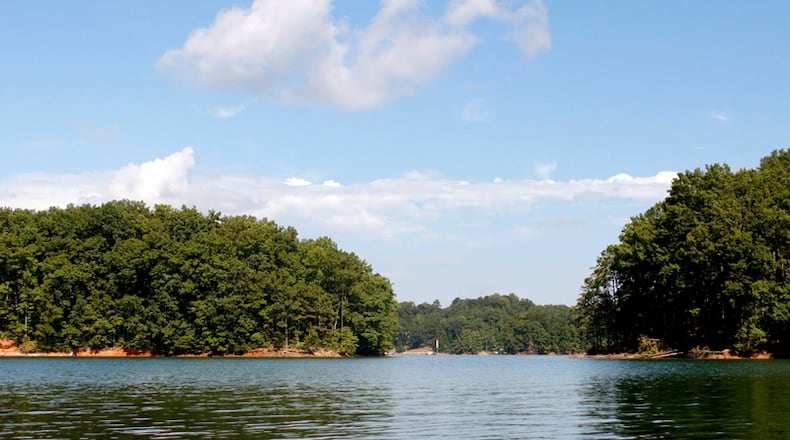 Beneath the placid surface of Lake Lanier lurk algae that produce compounds that can lend an off-putting smell and taste to drinking water. Forsyth County assures residents the substances are harmless and will go away with time.