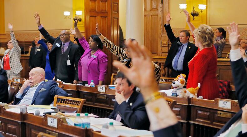 Georgia senators vote on a bill March 27. BOB ANDRES /BANDRES@AJC.COM