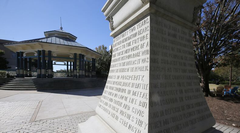 Behind the former courthouse in Decatur Square sits this Confederate monument. BOB ANDRES /BANDRES@AJC.COM