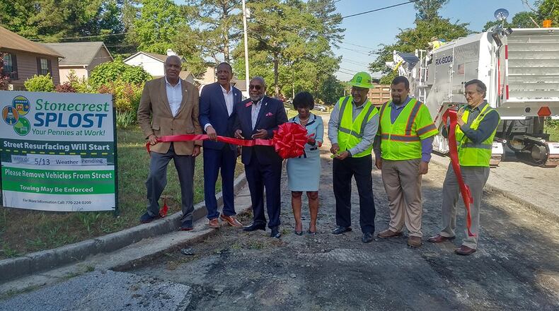 City officials held a ribbon-cutting Tuesday for Stonecrest's first paving project.