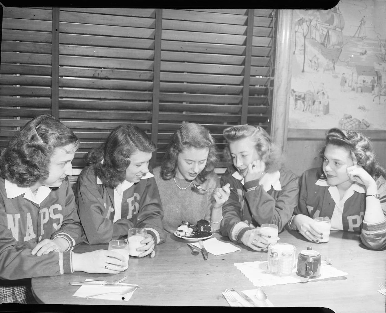 North Avenue Presbyterian School girls eating desert after playing basketball, 1947