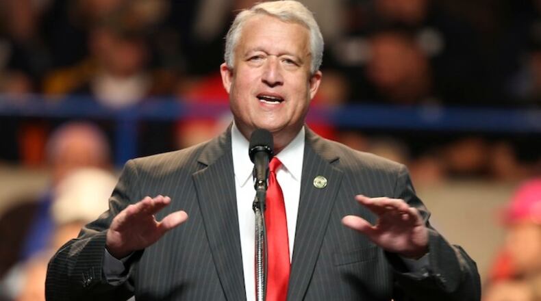West Virginia Senate president, Sen. Bill Cole, gestures during a rally for Republican Presidential candidate Donald Trump during a rally in Charleston, W.Va., Thursday, May 5, 2016. (AP Photo/Steve Helber)