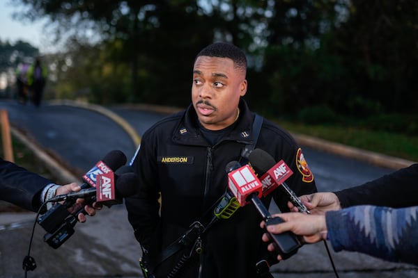 Atlanta fire Capt. Andrew Anderson updates reporters at the scene of a fire at the Abby Ridge Apartments on Thursday, Nov. 6, 2025. (Ben Hendren for the AJC)