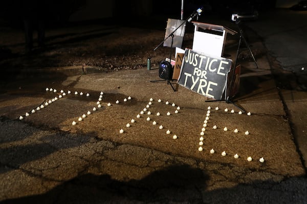 FILE - Candles spell out the name of Tyre Nichols during a candlelight vigil for Nichols on the anniversary of his death, Jan. 7, 2024, in Memphis. (AP Photo/Karen Pulfer Focht, file)