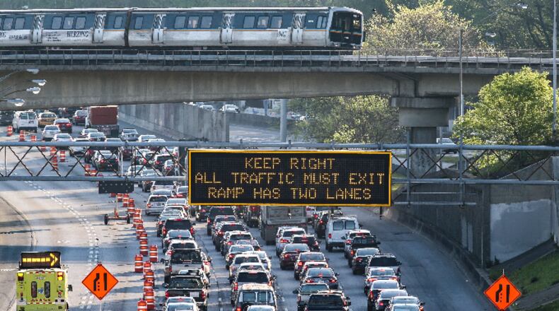 Traffic is thick on I-85 Monday morning. JOHN SPINK / JSPINK@AJC.COM