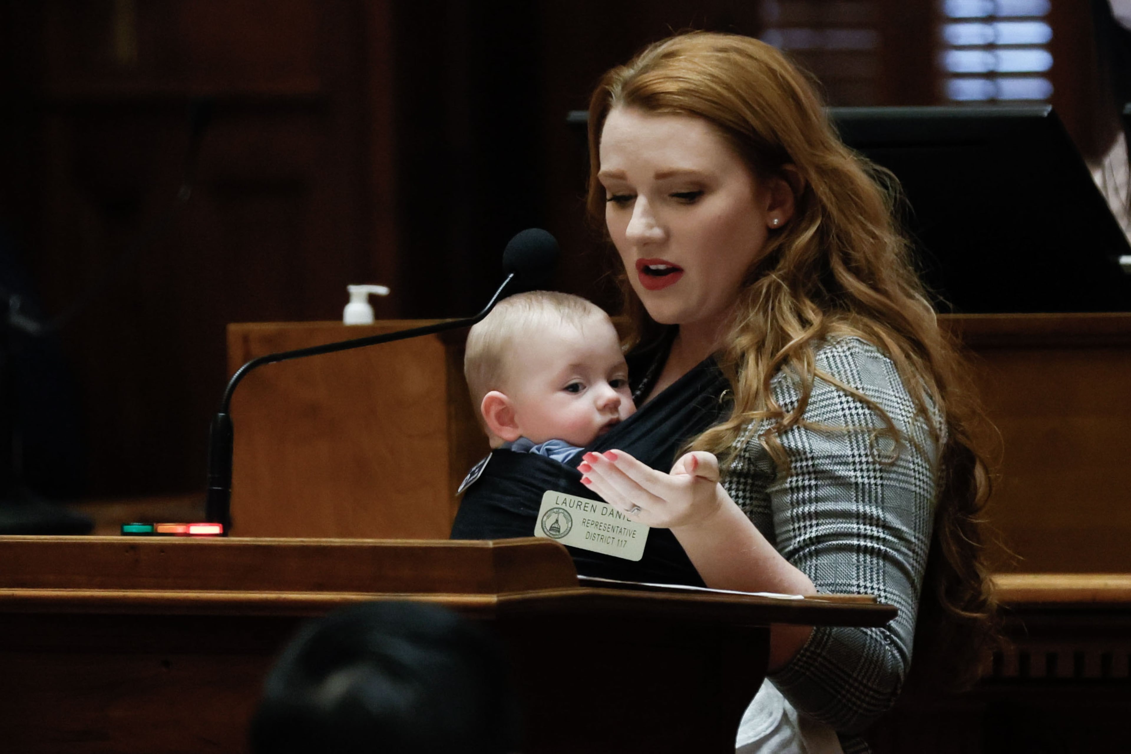 Former state Rep. Lauren Daniel, R-Locust Grove, lost her reelection bid in 2024. She's pictured holding her child at the Capitol a few month earlier.