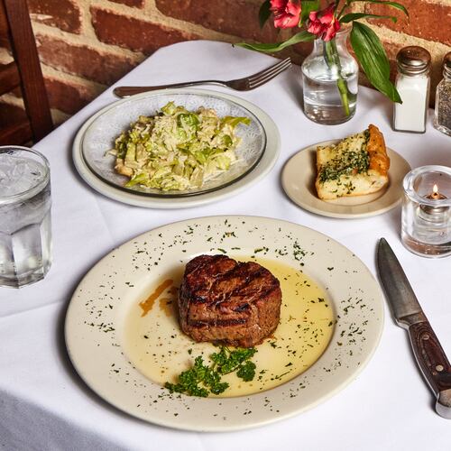 Hal's the Steakhouse takes inspiration from New Orleans, with plenty of seafood on the menu, That doesn't mean you can't get steak, caesar salad and a glass of red wine. It's a steakhouse, after all. (Bailey Garrot for the AJC)