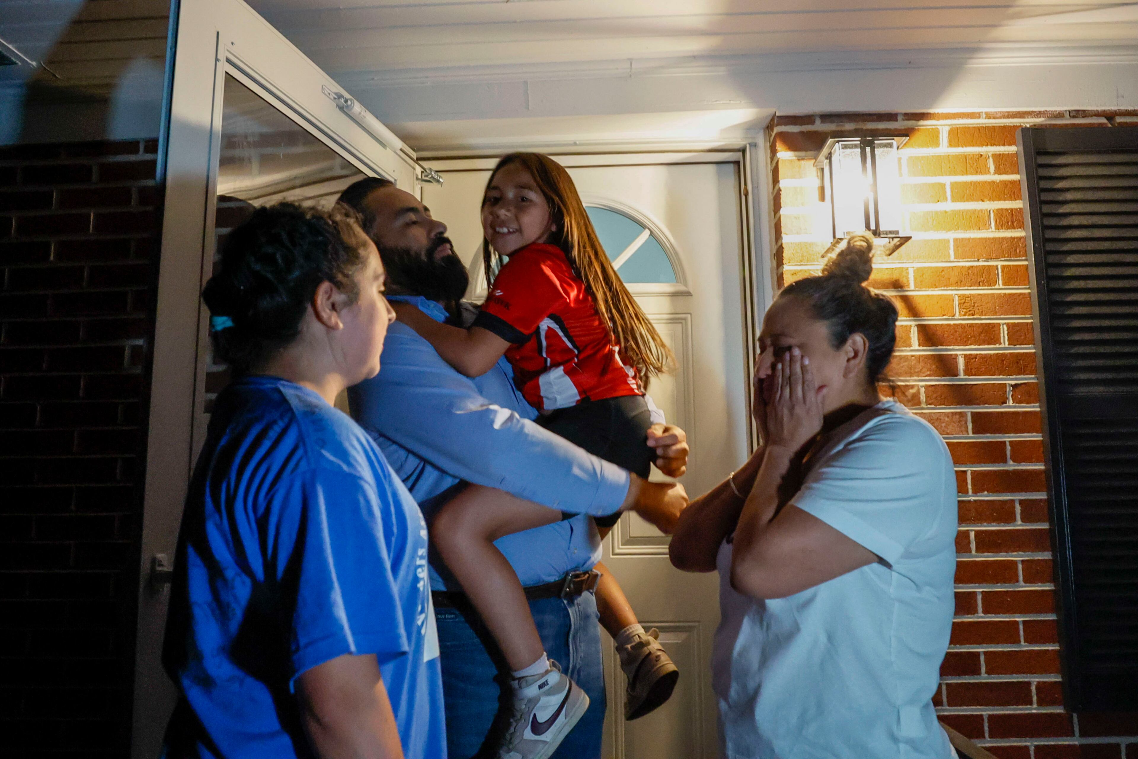 Jose Francisco Arias warmly embraces his daughter Daita Arias-Cristobal as his wife, Daita Cristobal, reacts, following the announcement that their eldest daughter, Ximena Arias-Cristobal, will be leaving the Stewart Immigration Detention Center to return home on Thursday, May 22, 2025.
(Miguel Martinez/ AJC)