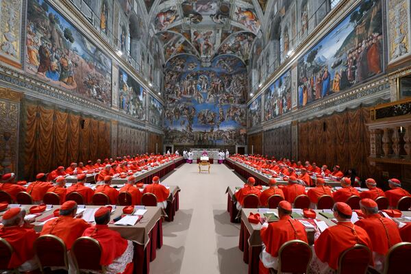 Cardinals attend the first day of the conclave to elect the successor of late Pope Francis inside the Sistine Chapel at the Vatican, Wednesday, May 7, 2025. (Vatican Media via AP)