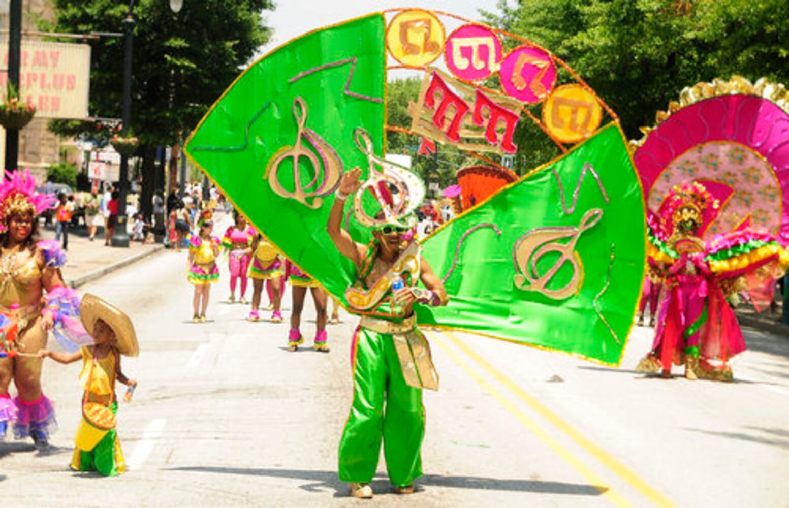 Colorful Caribbean Festival parade dazzles the day