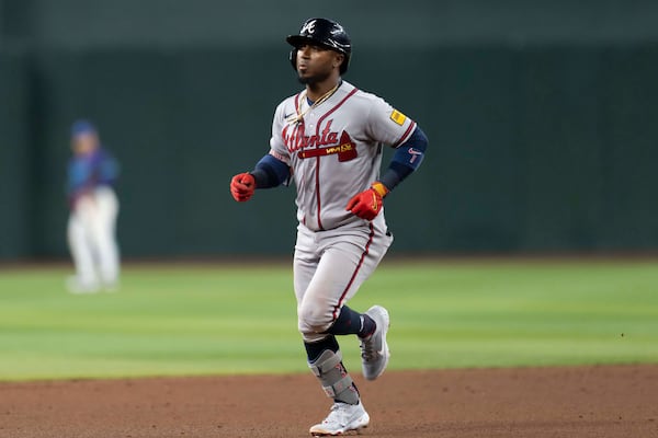 Atlanta Braves second baseman Ozzie Albies rounds the bases after hitting a home run during the ninth inning of a baseball game against the Arizona Diamondbacks, Friday, April 3, 2026, in Phoenix. (Rebecca Noble/AP)