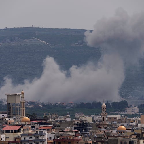 Smoke rises following an Israeli airstrike on the village of Qlaileh, as seen from the southern port city of Tyre, Lebanon, Wednesday, April 15, 2026. (AP Photo/Hussein Malla)