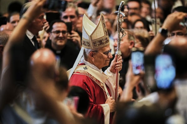 Pope Leo XIV arrives in St. Peter's Basilica at the Vatican, Sunday, to celebrate a Mass where he will bless the pallia for the new metropolitan archbishops, June 29, 2025. (AP Photo/Andrew Medichini)