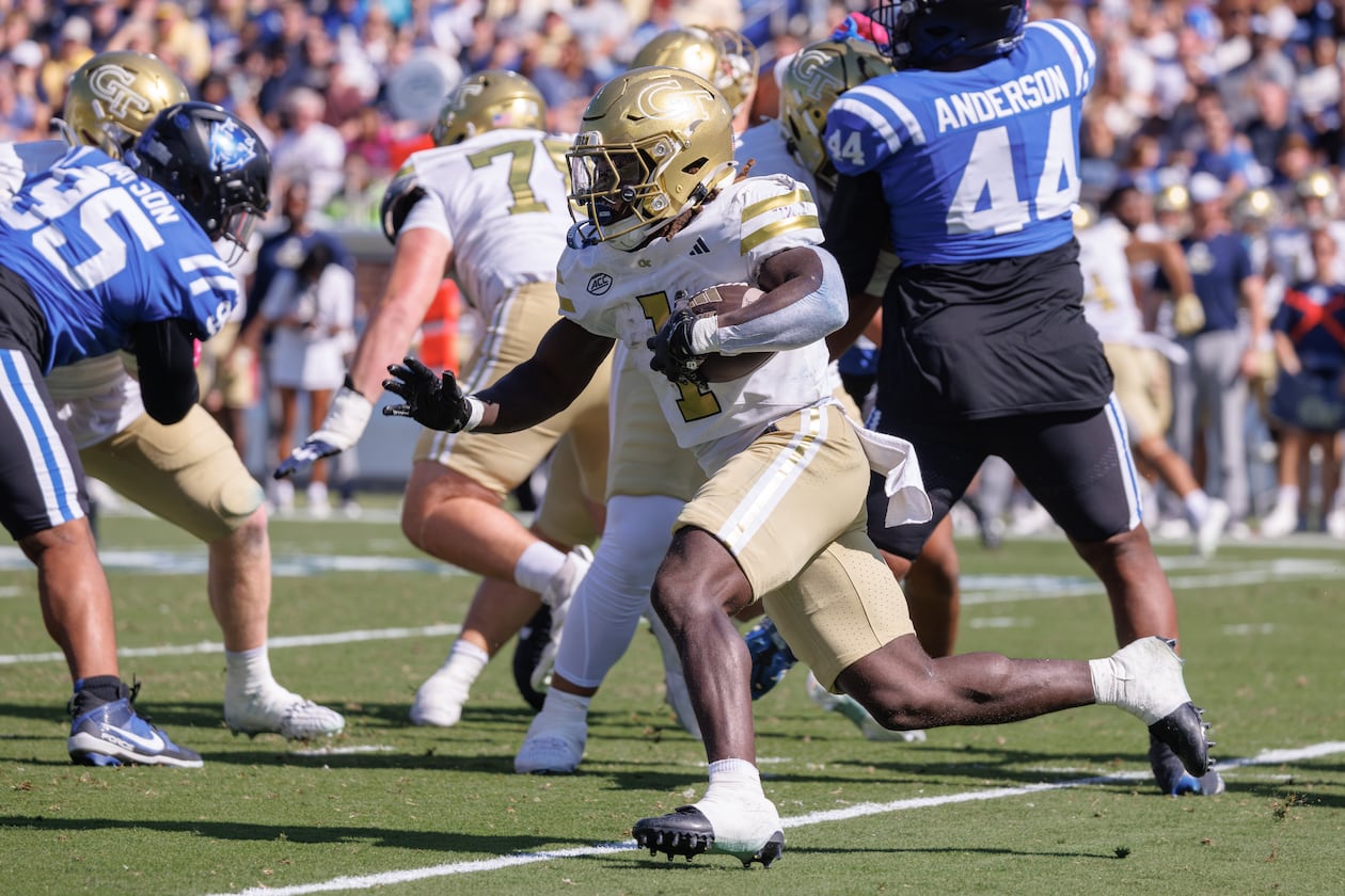 Georgia Tech's Jamal Haynes (center) carries the ball during the first half against Duke in Durham, N.C. on Saturday, Oct. 18, 2025. Haynes and the Yellow Jackets have averaged 3.025 million viewers for its four games on ESPN this season. (Ben McKeown/AP)