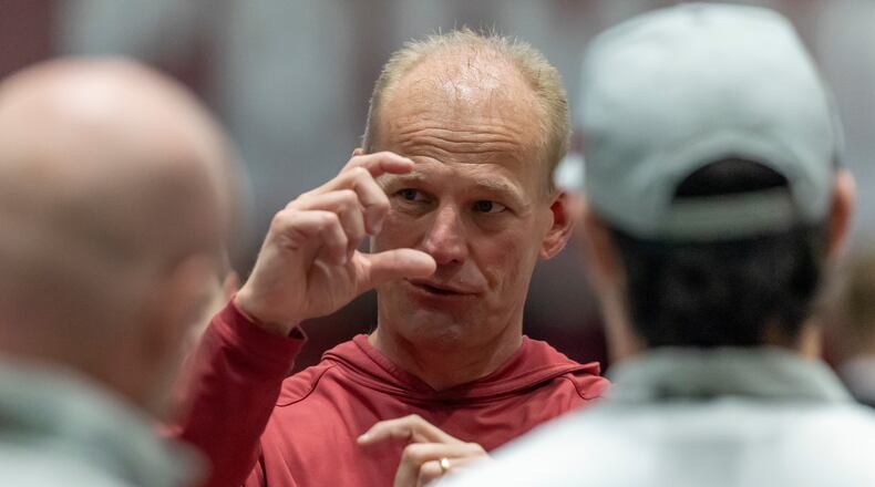 FILE - Alabama head coach Kalen DeBoer talks with visitors during Alabama's NFL football pro day, Wednesday, March 25, 2026, in Tuscaloosa, Ala. (AP Photo/Vasha Hunt, File)