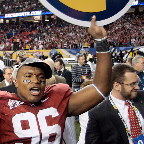 Alabama's Luther Davis reacts after its 32-13 win over Florida in the SEC championship NCAA college football game at the Georgia Dome in Atlanta on Dec. 5, 2009. Davis pleaded guilty Monday to fraud in a $20 million federal case accusing him of impersonating NFL players to secure loans. (Dave Martin/AP)