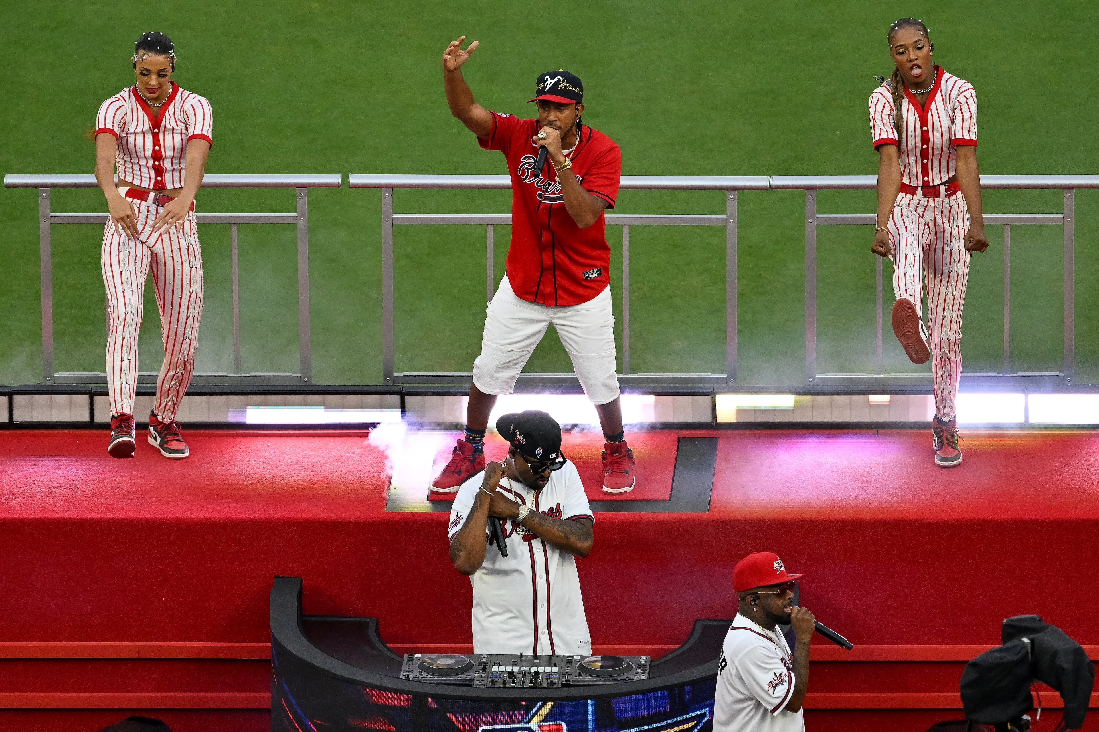 Jermaine Dupri and Ludacris entertain the crowd during a pregame performance to open the MLB All-Star Game at Truist Park in Atlanta on Tuesday, July 15, 2025. (Hyosub Shin/AJC)