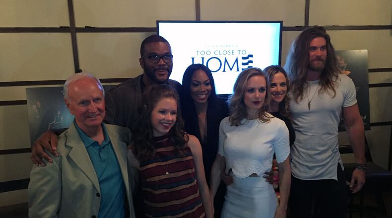 TLC's "Too Close to Home" cast and Tyler Perry: (L-R Alpha Trivette, Tyler Perry, Annie Thrash, Ashley Love-Mills, Danielle Savre, Kelly Sullivan, Brock O'Hurn at Trace at W Midtown.