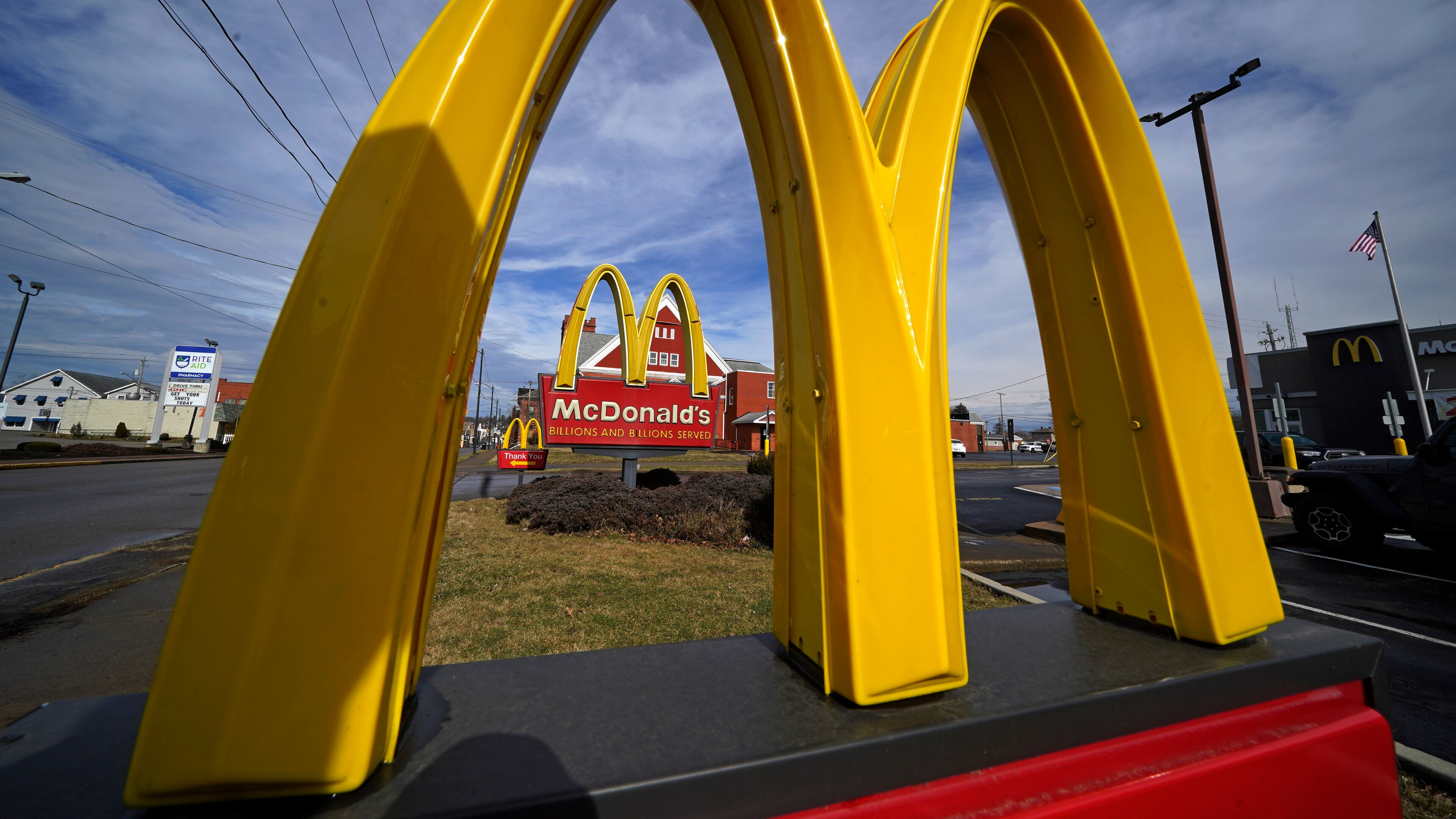 FILE - McDonald's restaurant signs are shown in in East Palestine, Ohio, Feb. 9, 2023. (AP Photo/Gene J. Puskar, File)