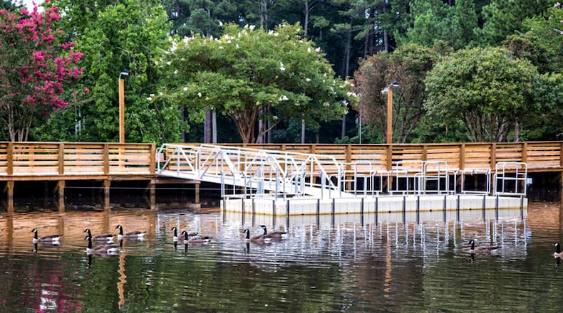 Staff of the Woodstock Parks and Recreation and Public Works departments recently completed a boardwalk and fishing pier in the lake at Dupree Park. CITY OF WOODSTOCK