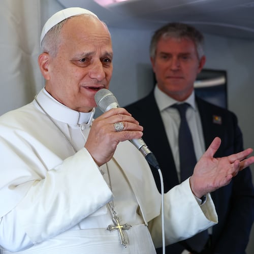 Pope Leo XIV speaks to journalists aboard his flight bound for Yaounde-Nsimalen International Airport, Cameroon, Wednesday, April 15, 2026, on the third day of an 11-day apostolic journey to Africa. (Guglielmo Mangiapane/Pool Photo via AP)