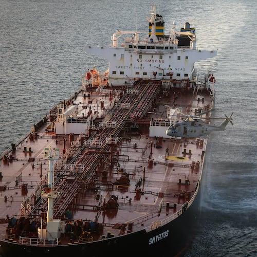 In this photo provided by the Royal Navy, Royal Marine Commandos detain sanctioned tanker, the Smyrtos, in the English Channel, Sunday, June 14, 2026. (LPhot Hutchins/Royal Navy via AP)