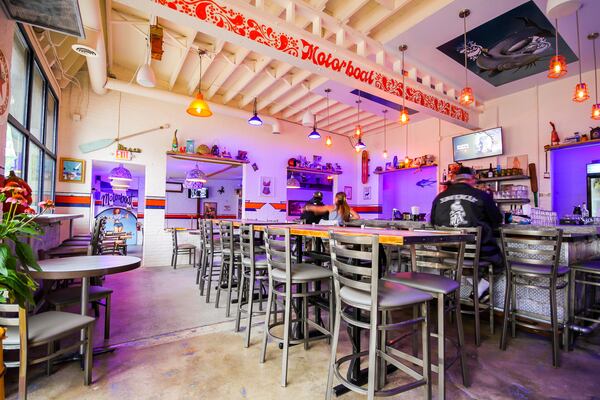 The decor of Motorboat has a retro water sports theme. (Courtesy of Praim Siribothi)