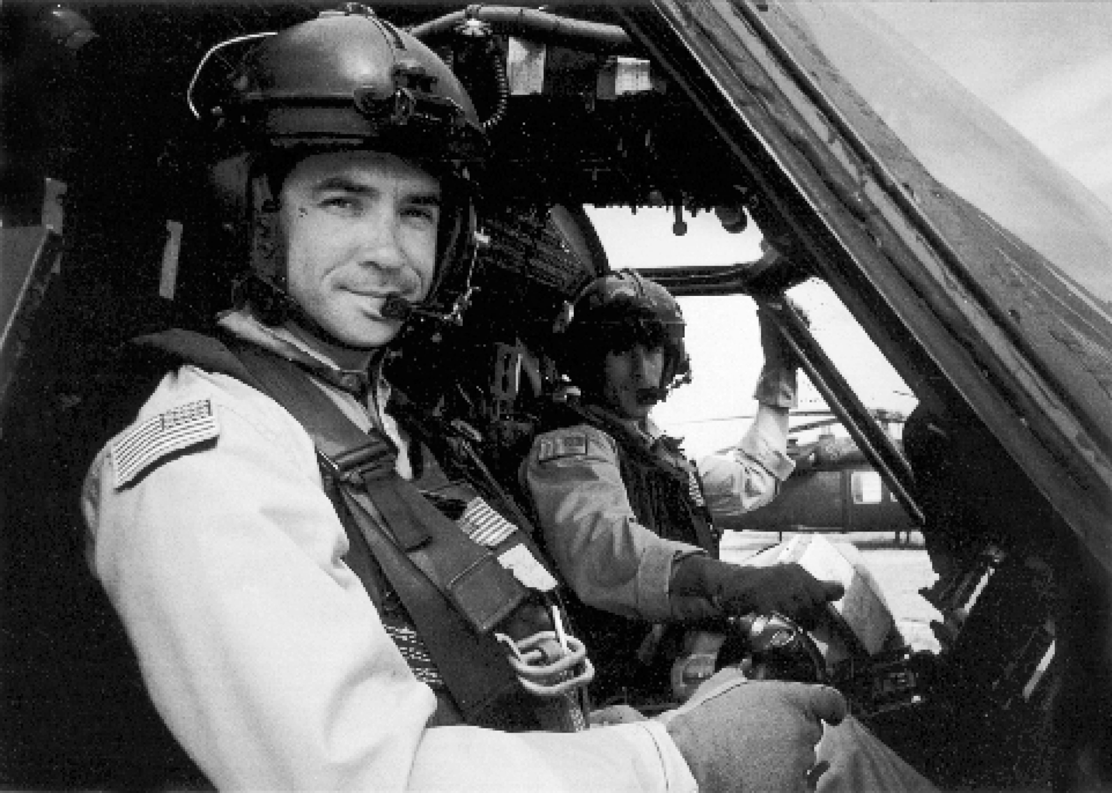 Michael Durant, left, in 1993 in Somalia. “I was a sitting duck,” Durant recalled about the Battle of Mogadishu, adding about Delta Force snipers Gary Gordon and Randall Shughart: “There is almost no doubt that I would have been killed, had they not acted.”
