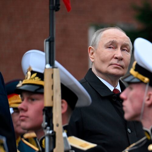 Russian President Vladimir Putin, centre foreground, attends a ceremony to lay flowers at the Tomb of the Unknown Soldier by the Kremlin wall inMoscow, Saturday, May 9, 2026, during celebrations of the 81st anniversary of the Soviet Union's victory over Nazi Germany during the World War II. (Alexander Nemenov/Pool Photo via AP)