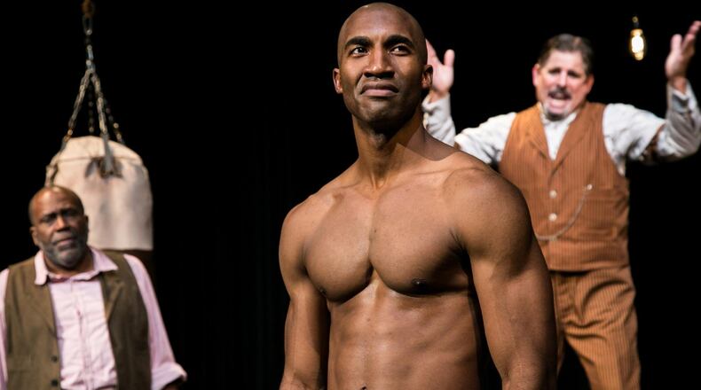 Theatrical Outfit’s boxing drama “The Royale” features Garrett Turner (center, flanked by Rob Cleveland, left, and Brian Kurlander). CONTRIBUTED BY CASEY GARDNER